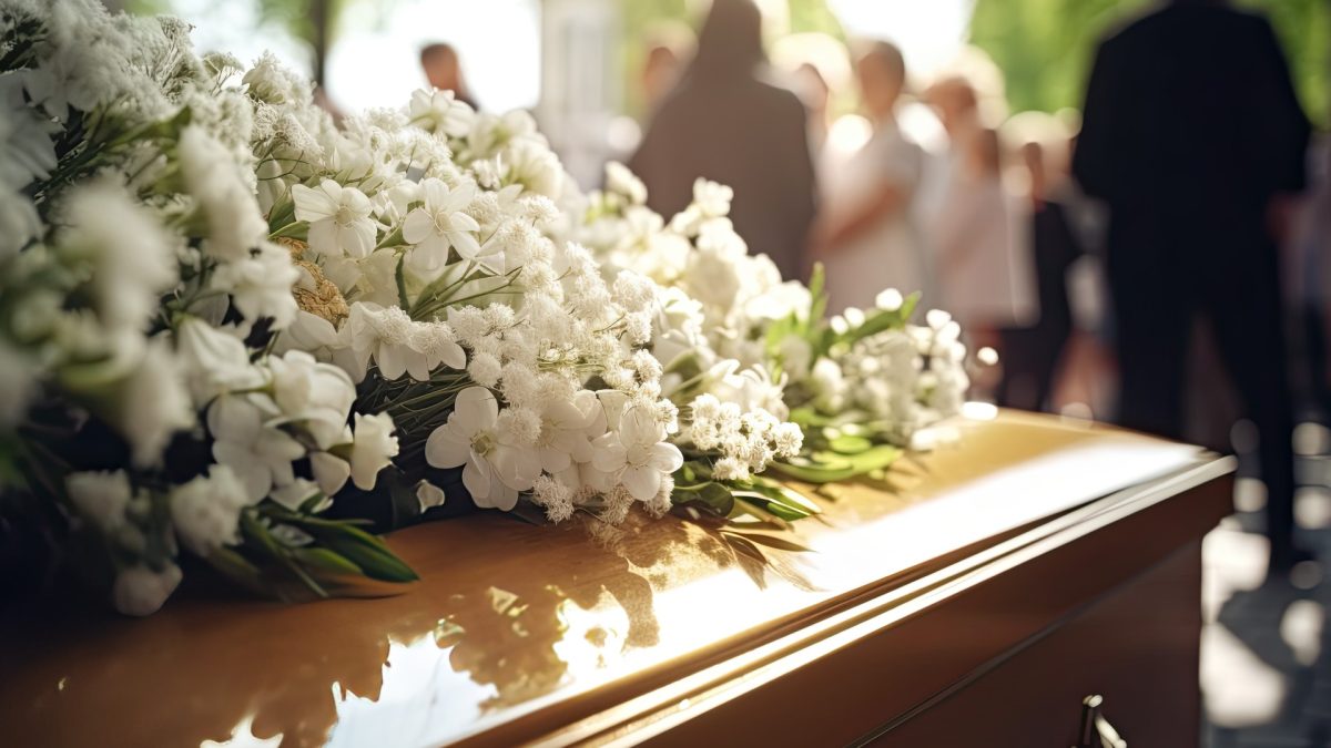 PROMPT: Describe a funeral from the dead person's viewpoint